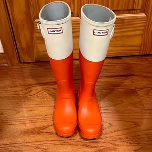 Orange color lock Hunter boots, never worn. Size 6